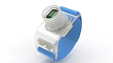 Wearable device with a blue strap and transparent casing, featuring a visible green circuit board and microchip under a cylindrical top.