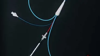 Catheter on black background