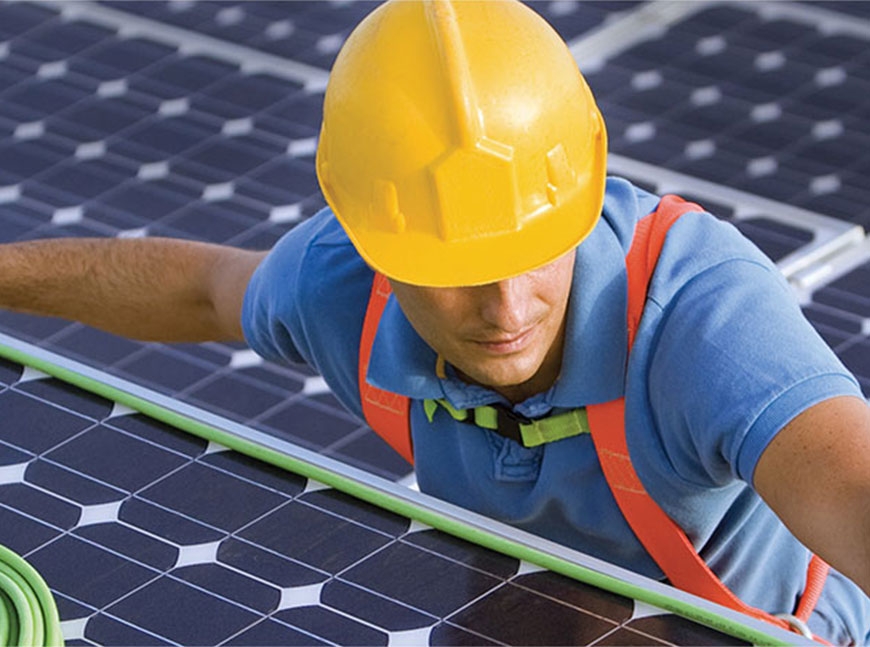 Man measuring solar panels